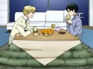 Tamaki chats to Kyoya as they share a meal at the latter's house.