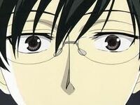 A close-up on Kyoya's surprised face.