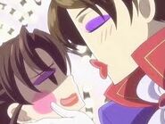 Beni-bara puckers up to kiss Haruhi a kiss.