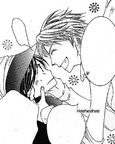 Hikaru pinches Haruhi's cheeks.