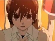 Haruhi defiantly defends her actions as Tamaki sternly rebukes her.