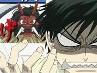 Kyoya's ire rather strangely emulates the demon's face behind him.