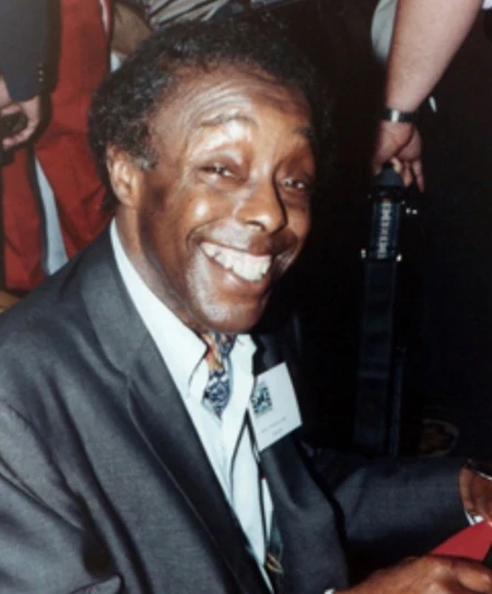 Morrison signing autographs