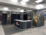 Red Barrels' The Outlast Trials game booth at MEGAMIGS Fest 2022