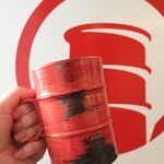 A mug stylized after the company's logo