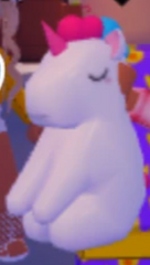 The Honey Plush in a player's hand.