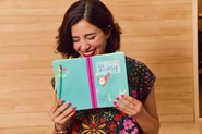 Natasha Kline holding Tater's diary