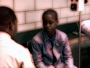 Young Hughes as seen in a flashback.