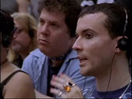 Tony Masters and Kiki Faye Downing watch television in Emerald City