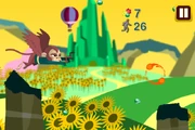 Gameplay. The Winged Monkey flies past the Emerald City.