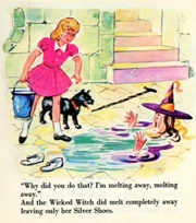 Peter Pan Book and Record - Dorothy obtains the silver shoes from the Wicked Witch of the West after melting her.
