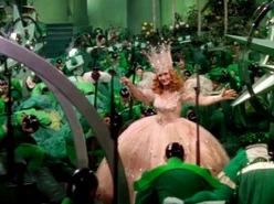 Glinda graces the Emerald City citizens with her presence.