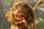 Fozzie as the Cowardly Lion in The Muppets' Wizard of Oz.