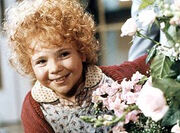 Aileen Quinn as Annie