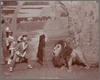 The Lion (Arthur Hill) wanting Pastoria (Gilbert Clayton) & General Riskitt (Harold T. Morey) to take his picture. 1903