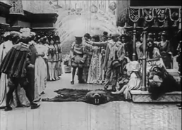 Ozma's throne room. Present: Ozma of Oz, the Wizard of Oz, the Cowardly Lion and Hungry Tiger.