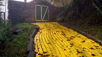 Land of Oz Gate with Oz spelled on it