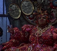 A picture of Evamene hangs above her sister Evillene's Throne