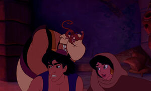 Jasmine and Aladdin fleeing as Abu fights Razoul.