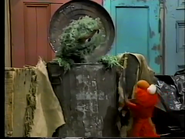 Oscar and Elmo are communicating in Sesame Street Episode 3256.