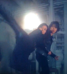 Toko using her kicking kicking martial arts expert to knock down one of Yagami's Thug