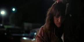 Joyce being embraced by Hopper.