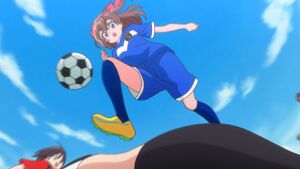 Yui play soccer.