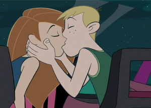 Kim and Ron, finally graduated, share a kiss as the series officially ends.