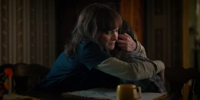 Joyce hugging a tearful and scared Will.