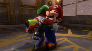 Luigi hugging his brother Mario after he was free from the painting in Luigi's Mansion 3.