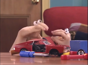 Oobi yelling at Uma for breaking his toy car.