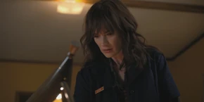 Looking for tape to fix Will's costume, Joyce a peculiar drawing of a large black, shadowy creature.