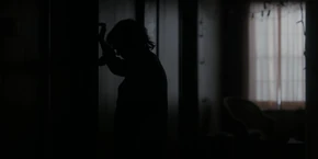 Joyce checking the walls.