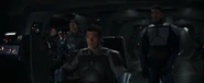 Axe Woves spoke to Shuggoth from the command chair of Moff Gideon's former light cruiser.