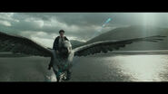 Buckbeak flying as Harry rides on him.