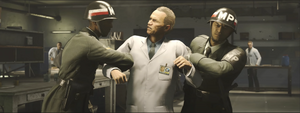 Dr. Oskar Strauss arrested by MPs while kicking and yelling, his heroic breakdown in front of the scientists in the Laboratory.