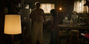 Back inside, Joyce and Hopper discuss the mysterious thug and why they didn't find anything at the lab.