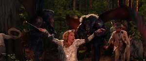 Glinda gets captured by two of Evanora's winged baboons.