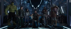 Loki with Thor, Hulk, Valkyrie, Heimdall, Korg, and Asgardians journeying towards Earth.