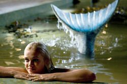 Aquamarine as a mermaid in the pool