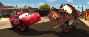 McQueen and Mater doing a handshake.