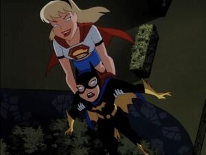 Supergirl saving Batgirl