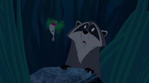 Meeko and Flit watching Pocahontas go to a waterfall as she looks for John Smith.