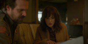 Joyce noticing something in the drawings.