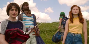 Lucas, Will, and Max hearing Dustin decide to keep going up Weathertop.