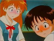 Shinji and Asuka blushing at each other