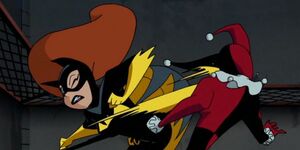 Batgirl kicking Harley Quinn