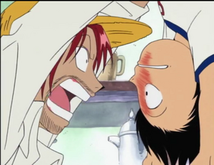 Shanks worried after Luffy ate a Devil Fruit.