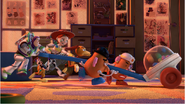 Mr. Potato Head running with his wife Mrs. Potato Head, Buzz, Jessie and Slinky in Toy Story 3