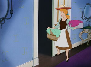 After serving Anastasia her breakfast, Cinderella enters her stepmother's bedroom so she can give her her breakfast tray.